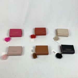 11883-A2*CX360 CARTEIRA FEMININA COM A SUPEFICIE EXTERIOR EM MATERIAL PLÁSTICO